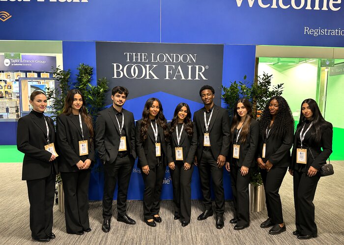 Atlas registration team at a corporate publishing event